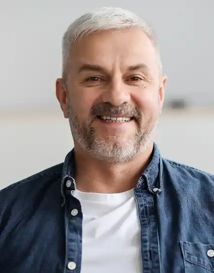 aged male dental patients very happy after received All on 4 dental implants in San Diego